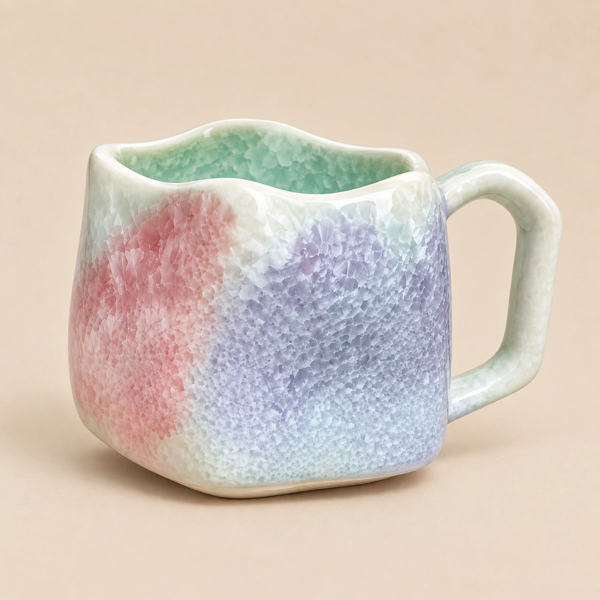 Coral pink ceramic wave mug with frost lilac and pearl white tones