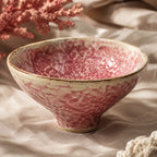 Close-up ceramic texture of coral pink dessert bowl