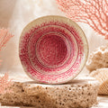 Vibrant coral pink ceramic pasta bowl with smooth glazed finish