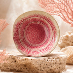 Vibrant coral pink ceramic pasta bowl with smooth glazed finish