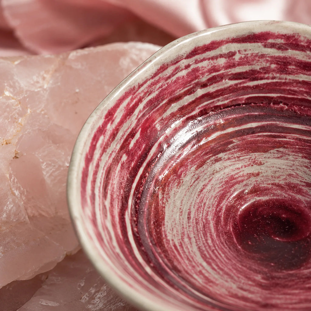 Close-up glaze detail of coral pink ceramic rice bowl