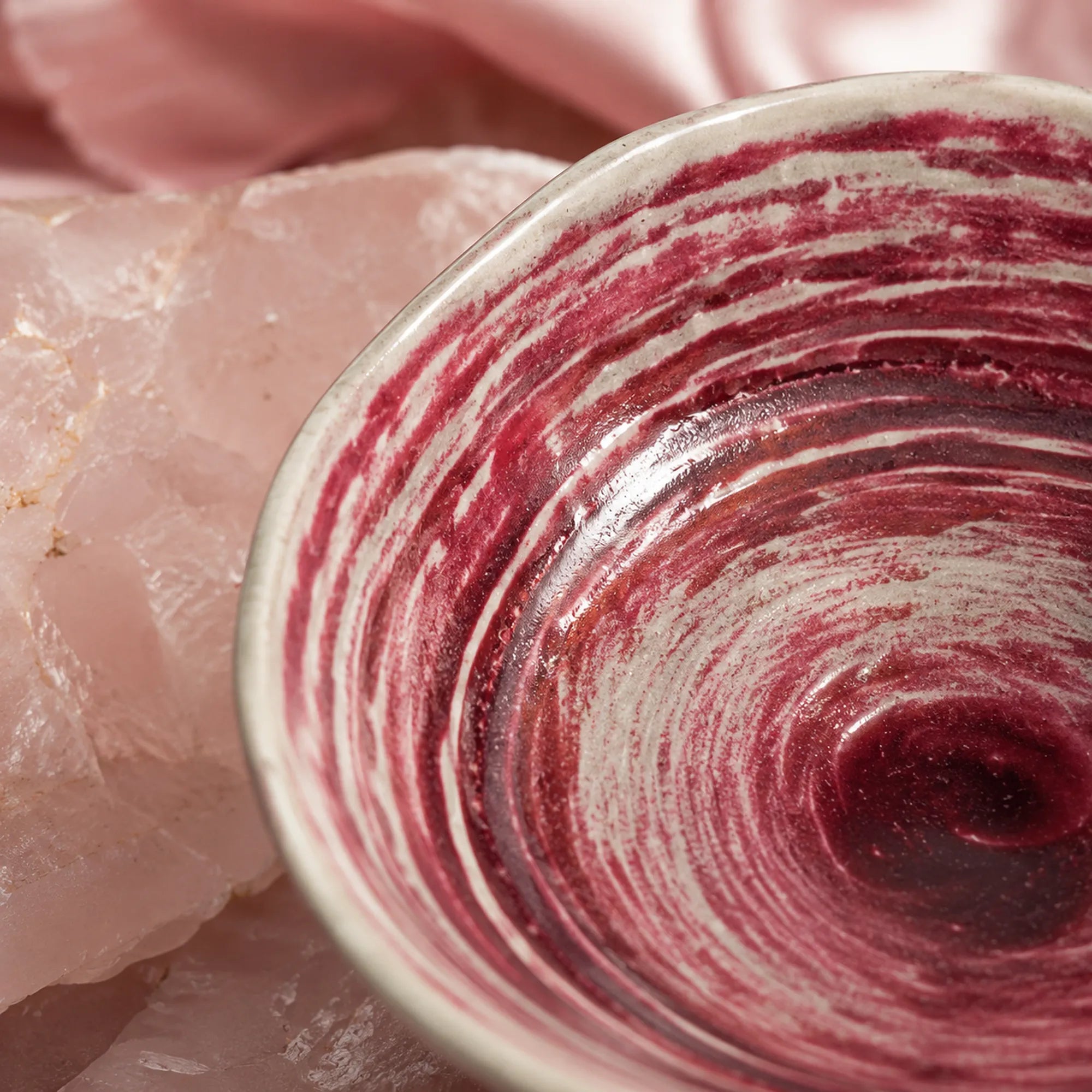 Close-up glaze detail of coral pink ceramic rice bowl