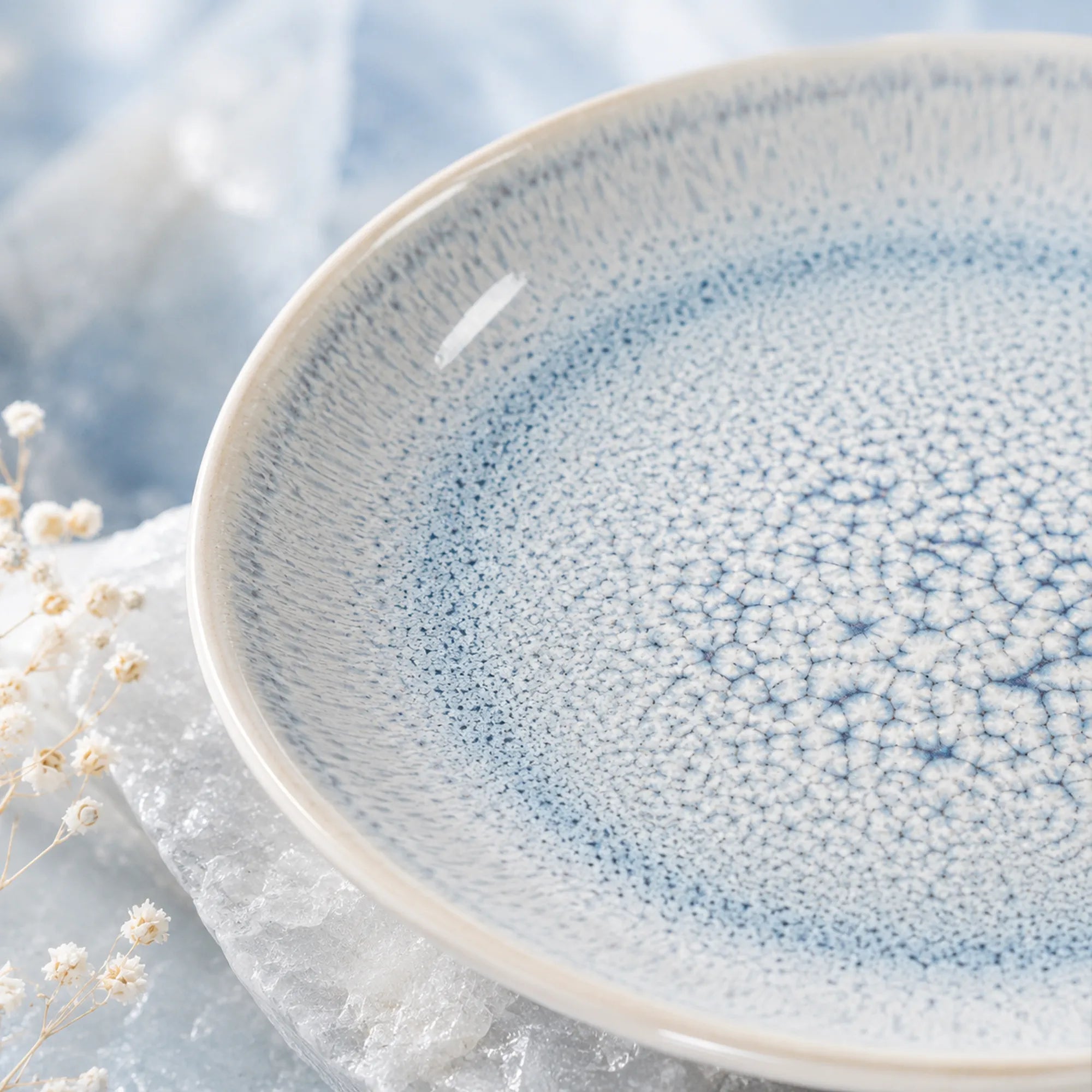 Close-up ceramic texture of frost blue dinner plate