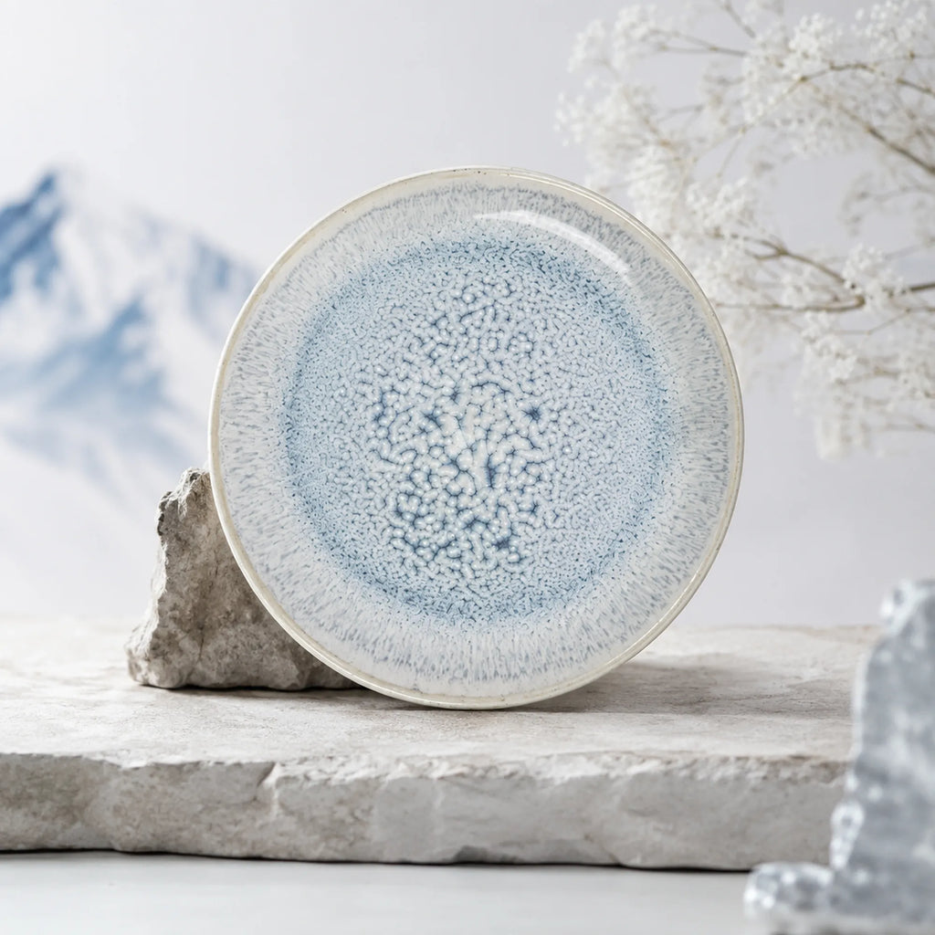 Crackle frost blue ceramic dinner plate with layered glaze texture