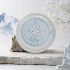 Crackle frost blue ceramic dinner plate with layered glaze texture