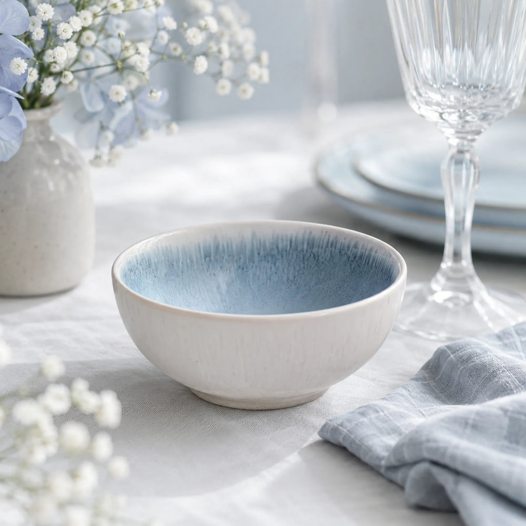 Frost blue ceramic rice bowl styled in a calm dining setting