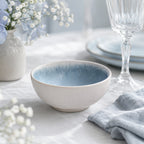 Frost blue ceramic rice bowl styled in a calm dining setting