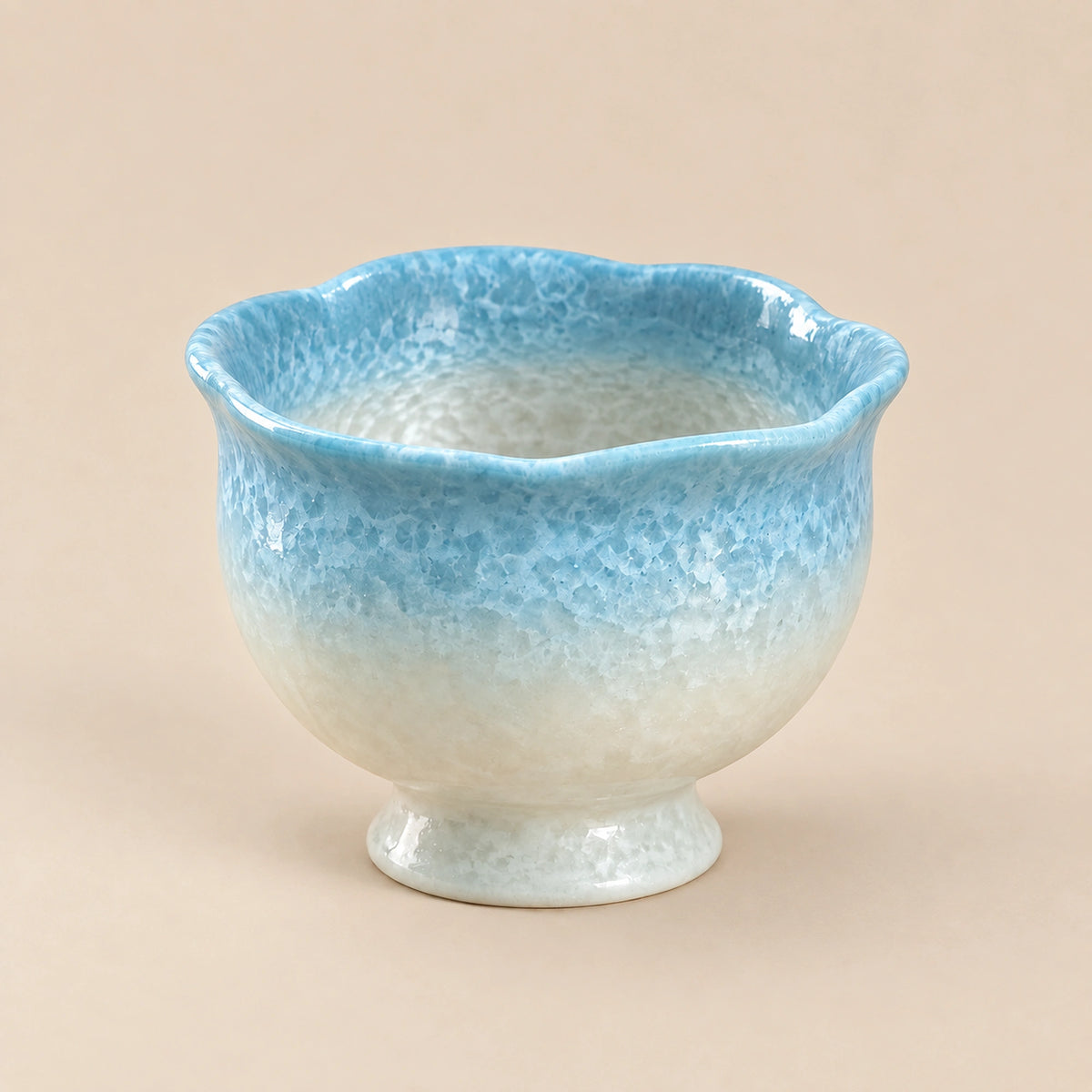 Glacier blue ceramic footed tea cup with pearl white detail