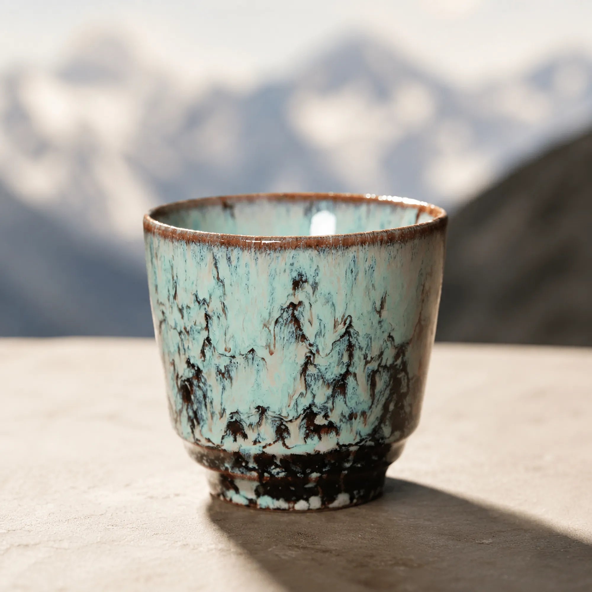 Crackle ice blue ceramic tea cup with textured glaze finish