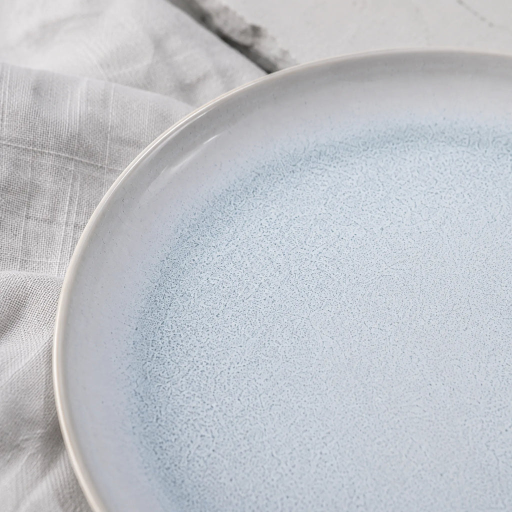 Close-up glaze texture of mist blue ceramic dinner plate