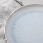 Close-up glaze texture of mist blue ceramic dinner plate