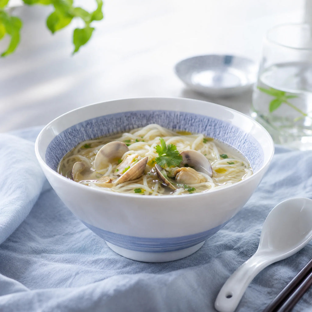 Serene mist blue ceramic soup bowl served with warm food