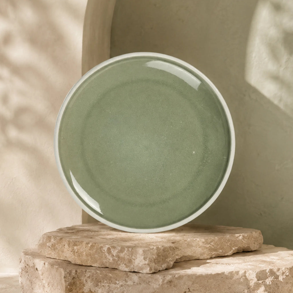 Organic moss green ceramic dinner plate with textured glaze