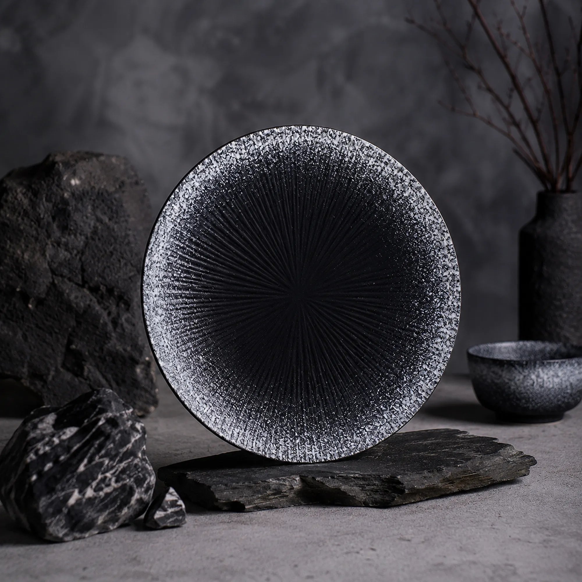 Japanese obsidian black ceramic dinner plate with deep matte texture