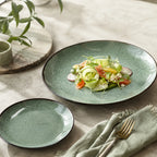 Peacock green ceramic dinner plate styled with fresh food