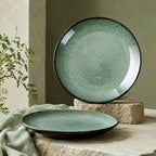 Peacock green ceramic dinner plate with textured glaze