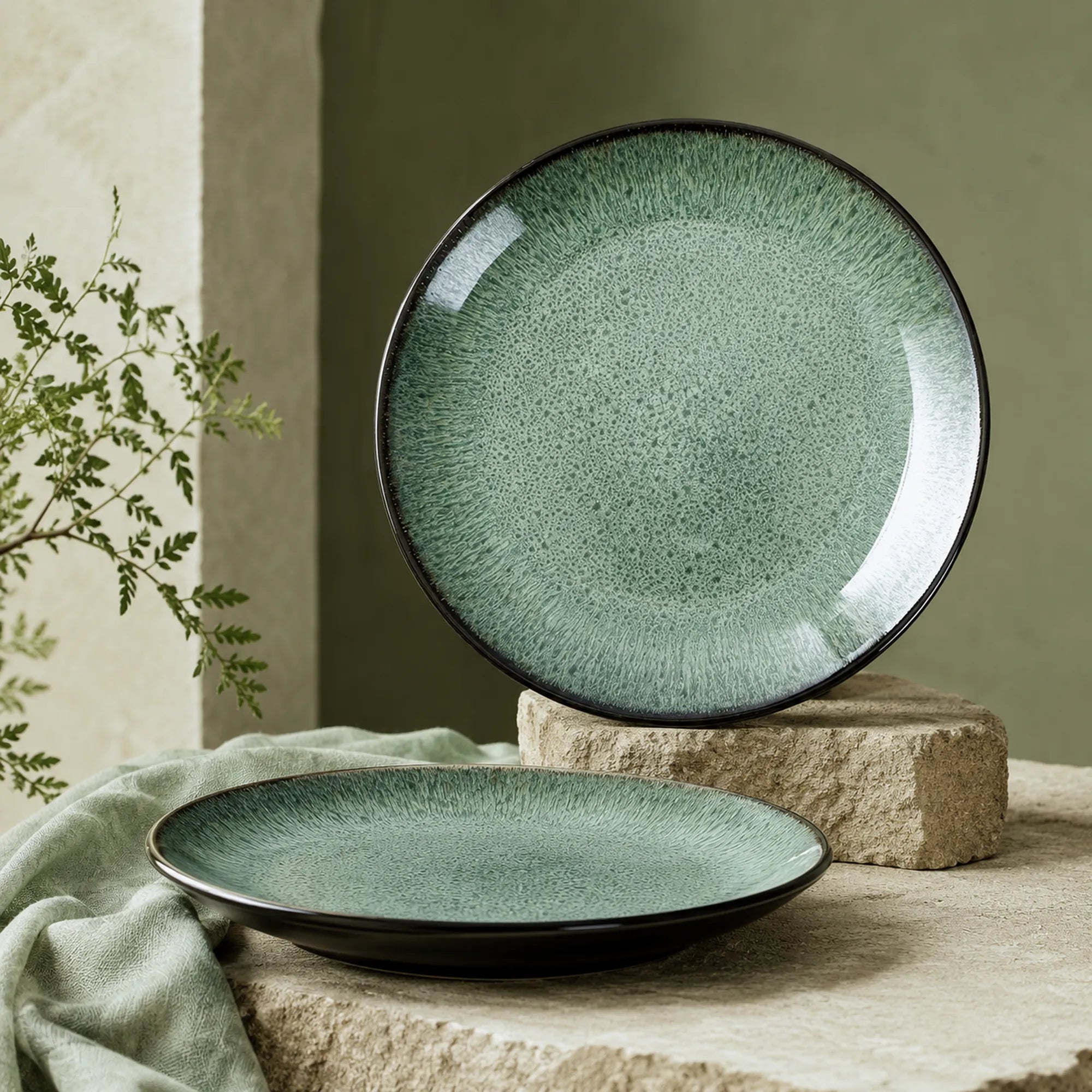 Peacock green ceramic dinner plate with textured glaze