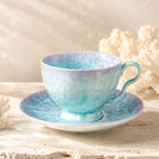 Pearl blue ceramic coffee cup set styled on a modern coffee table