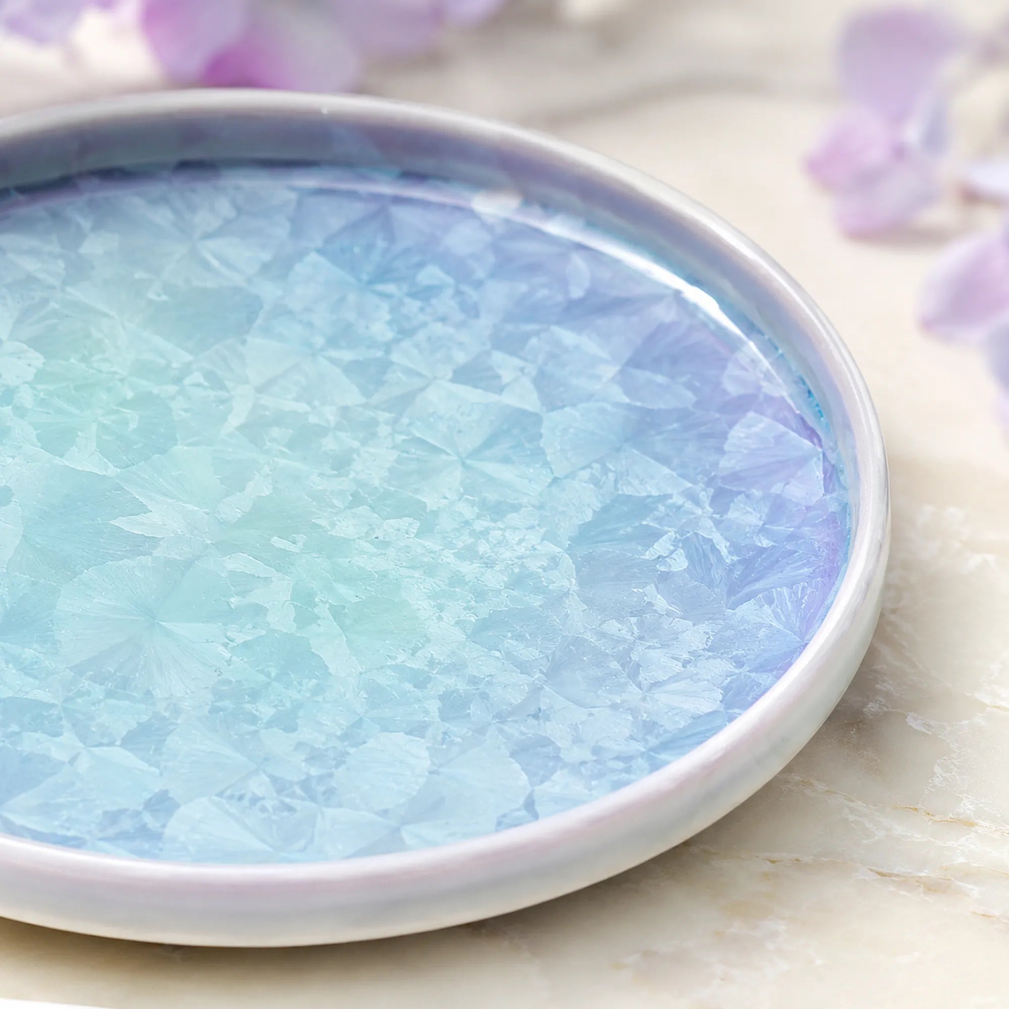 Close-up ceramic texture of pearl blue side plate