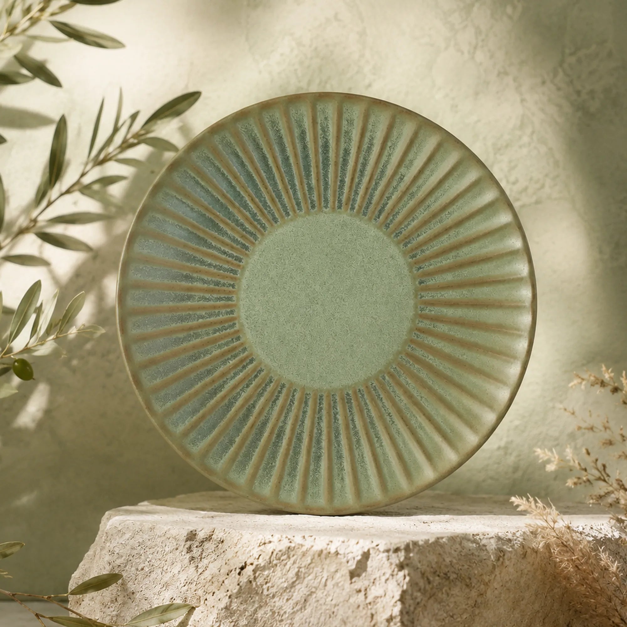 Organic sage green ceramic dinner plate with textured glaze