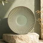 Organic sage green ceramic pasta plate with textured glaze