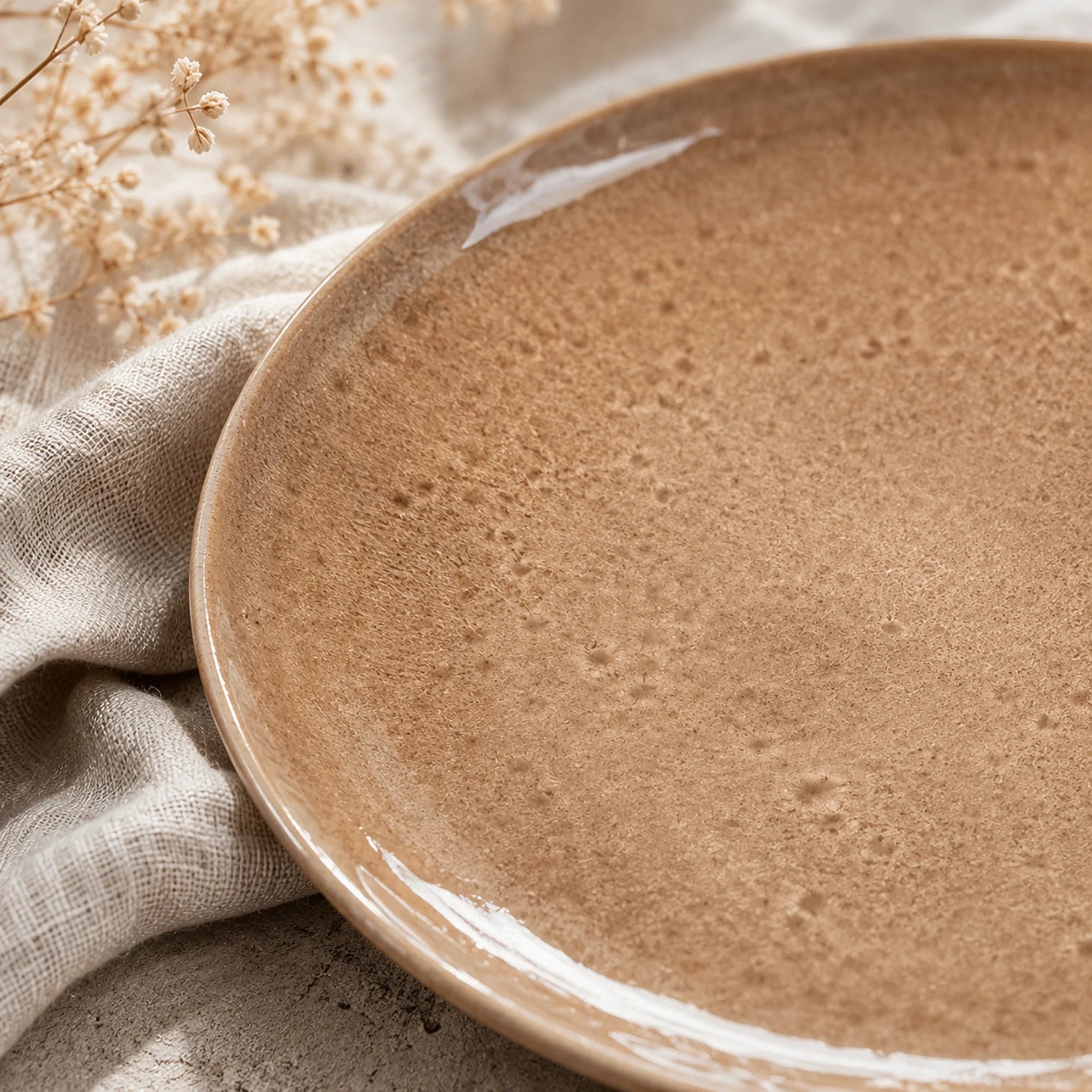 Close-up ceramic texture of sand beige dinner plate
