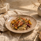 Sand beige ceramic dinner plate styled with plated food