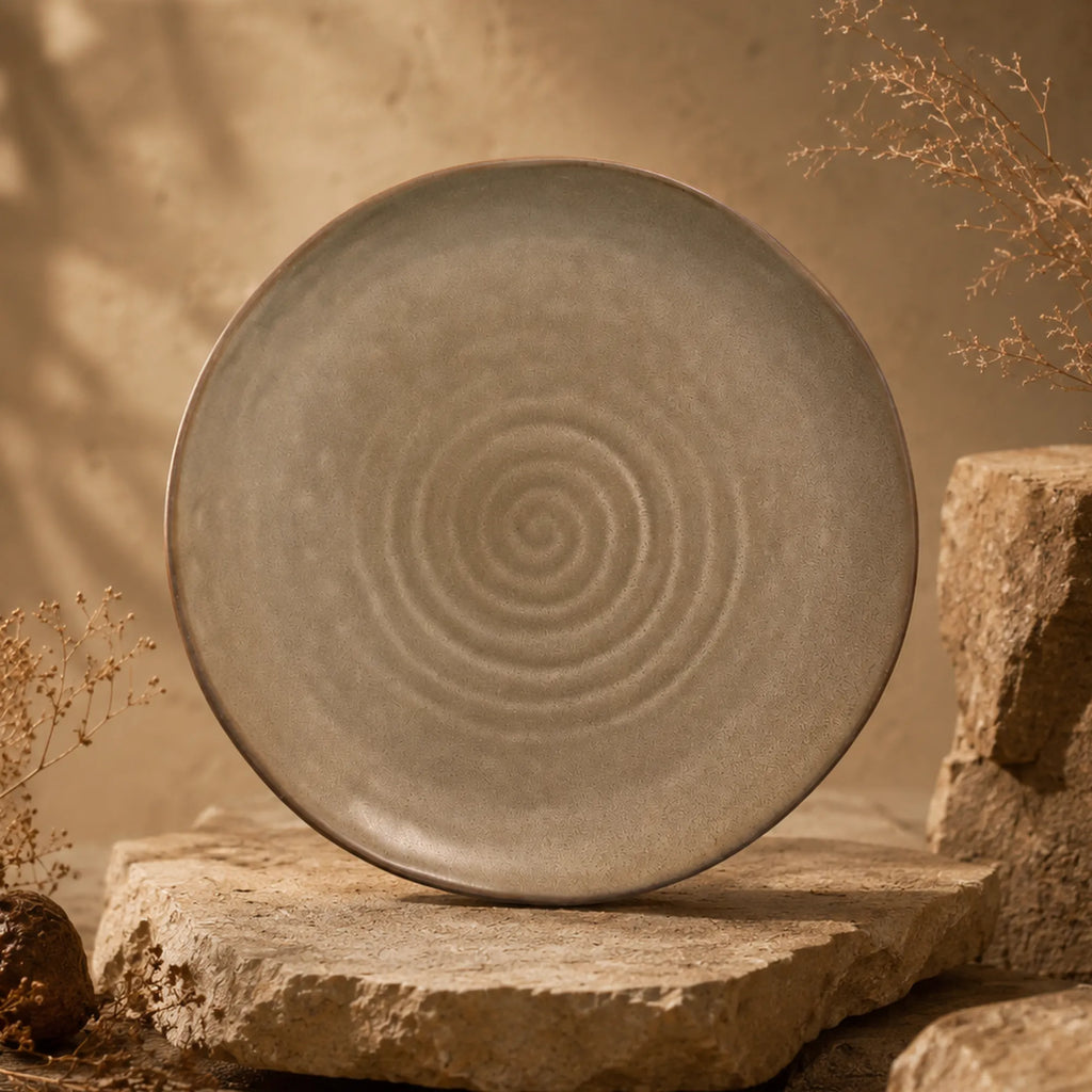 Sand brown spiral ceramic dinner plate with earthy textured finish