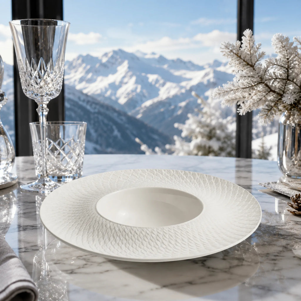 Snow white ceramic pasta plate styled in a calm dining setting